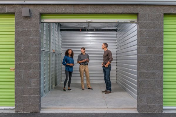 People checking out a storage unit