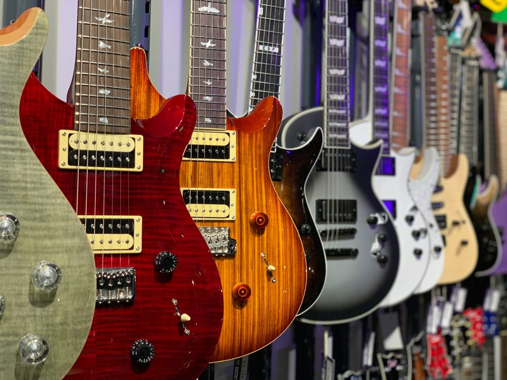 guitars on storage rack
